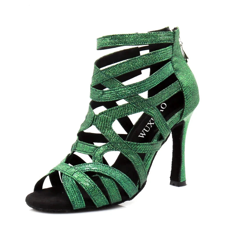 A single green glittery high-heeled sandal with crisscross ankle straps and a peep toe, shown on a white background with the brand name WUXIJIAO.