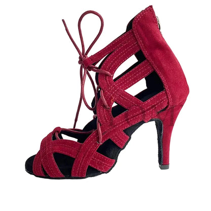 A red suede high-heeled sandal with cutout straps and lace-up front, shown on a white background with a YSWEYOMIC brand watermark.