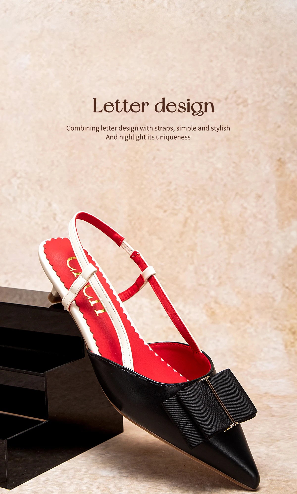 Red and black shoe with bow detail on a textured surface