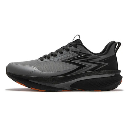 A gray and black athletic running shoe with a thick cushioned sole and subtle orange accents on the outsole, shown from a side profile on a white background.