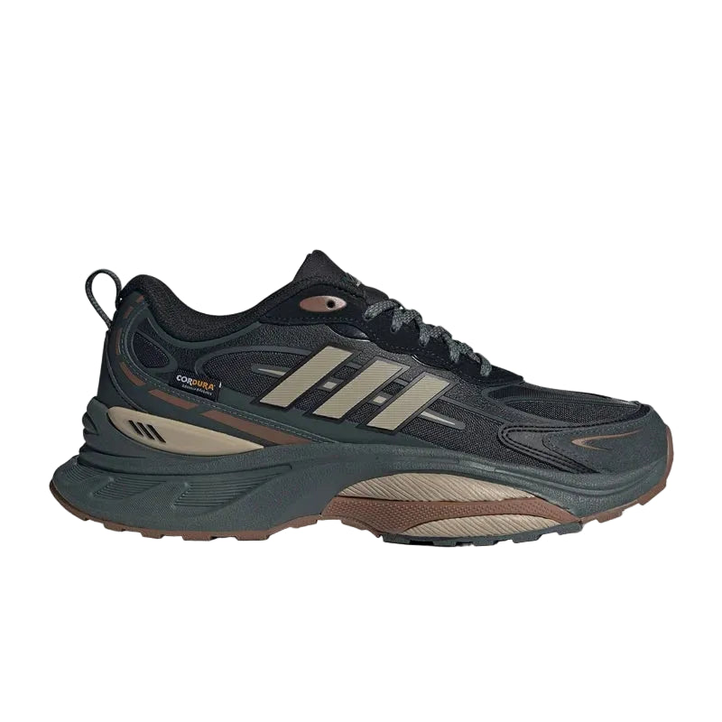 Dark gray running shoe with beige accents on a white background