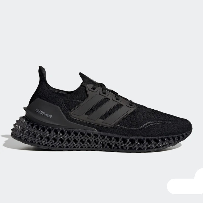 Black Adidas sneaker with unique sole design on a light gray background