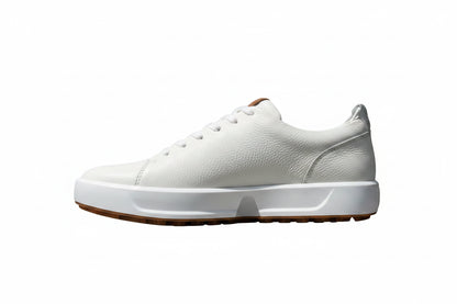 A white leather low-top sneaker with a chunky white sole and a brown gum outsole, shown in a side profile on a white background.