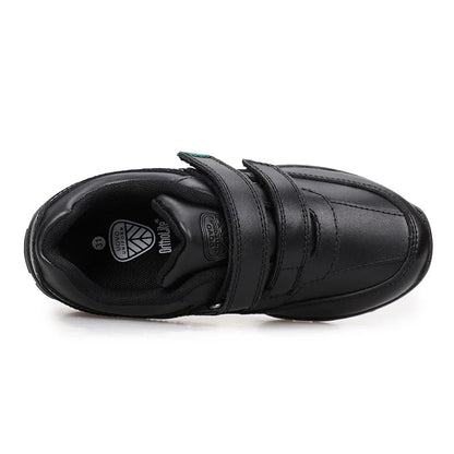 A black UOVO brand children's low-top sneaker with a hook-and-loop strap closure, shown from a side profile view on a white background.