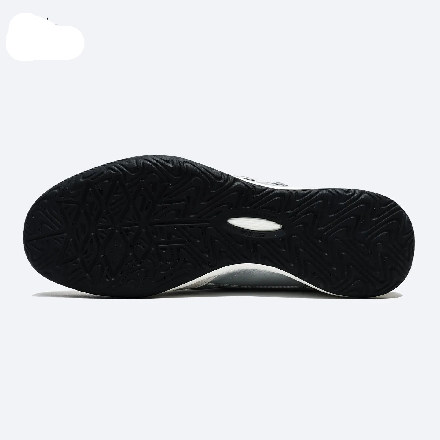 The black textured rubber outsole of a KELME athletic shoe, shown from a top-down view against a light gray background.