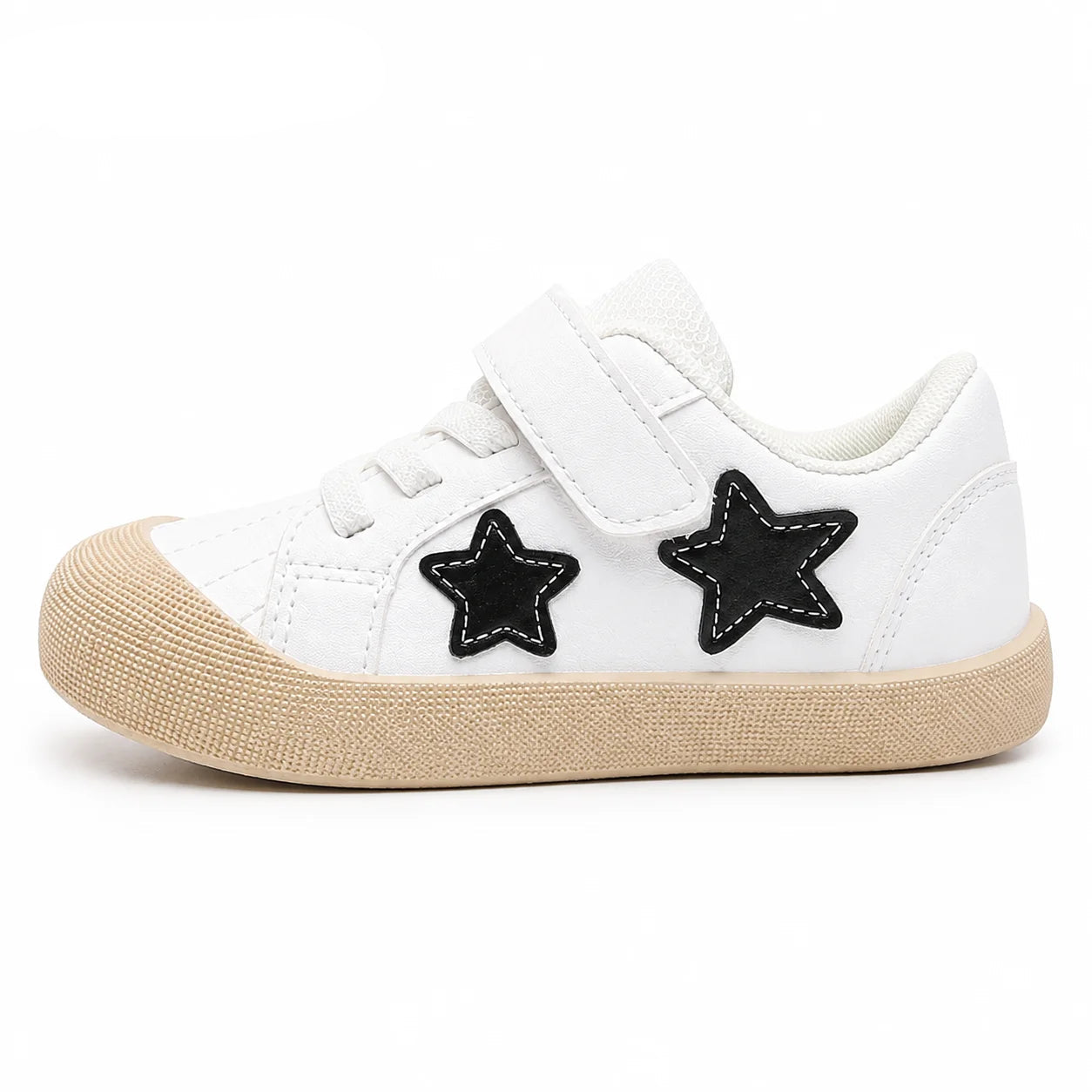 A white children's low-top sneaker with a hook-and-loop strap, two black star-shaped patches on the side, and a beige textured rubber sole. The PmwRun brand logo is visible in the top left corner.