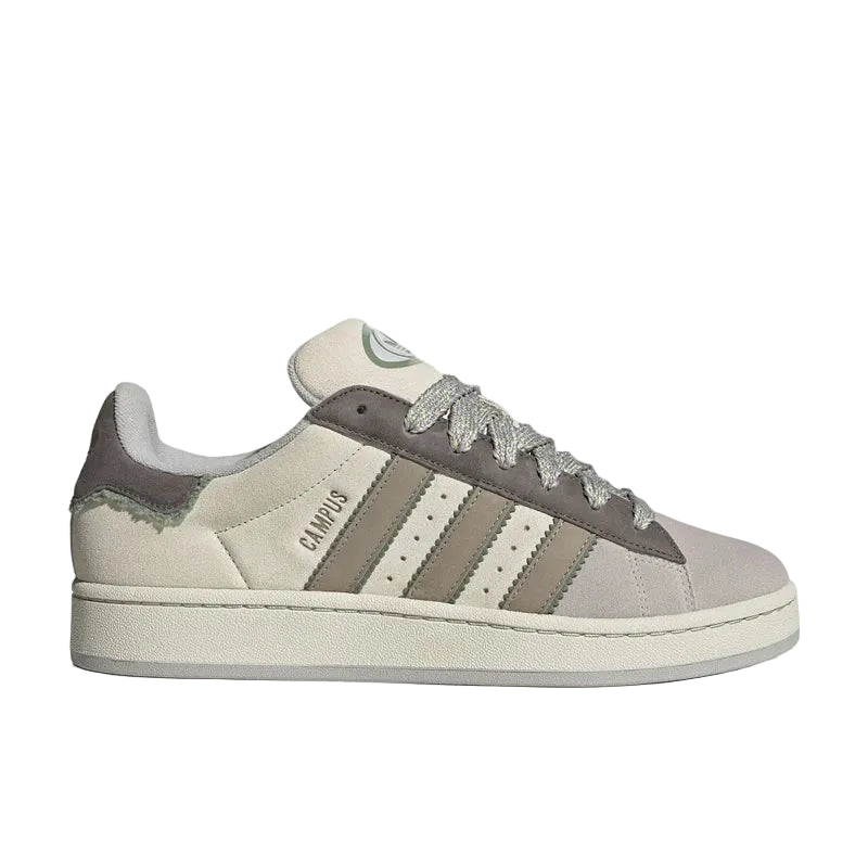 Gray and white sneaker with Adidas logo on a light gray background