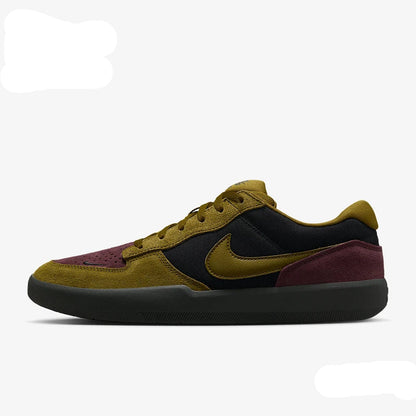 A low-top Nike sneaker shown in side profile on a light gray background. The shoe features an olive green suede and mesh upper with black panels, a green Swoosh, burgundy suede overlays, and a thick black sole.