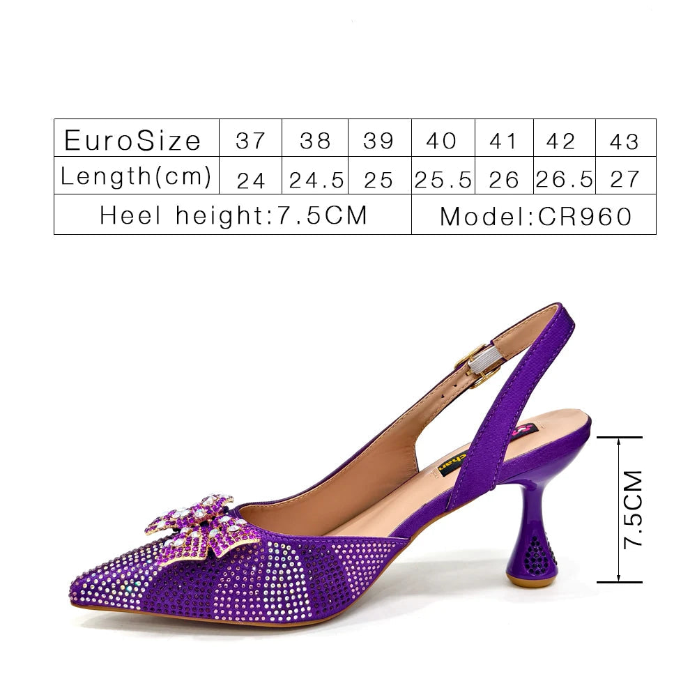 Purple high-heeled shoe with embellishments and size chart on a white background